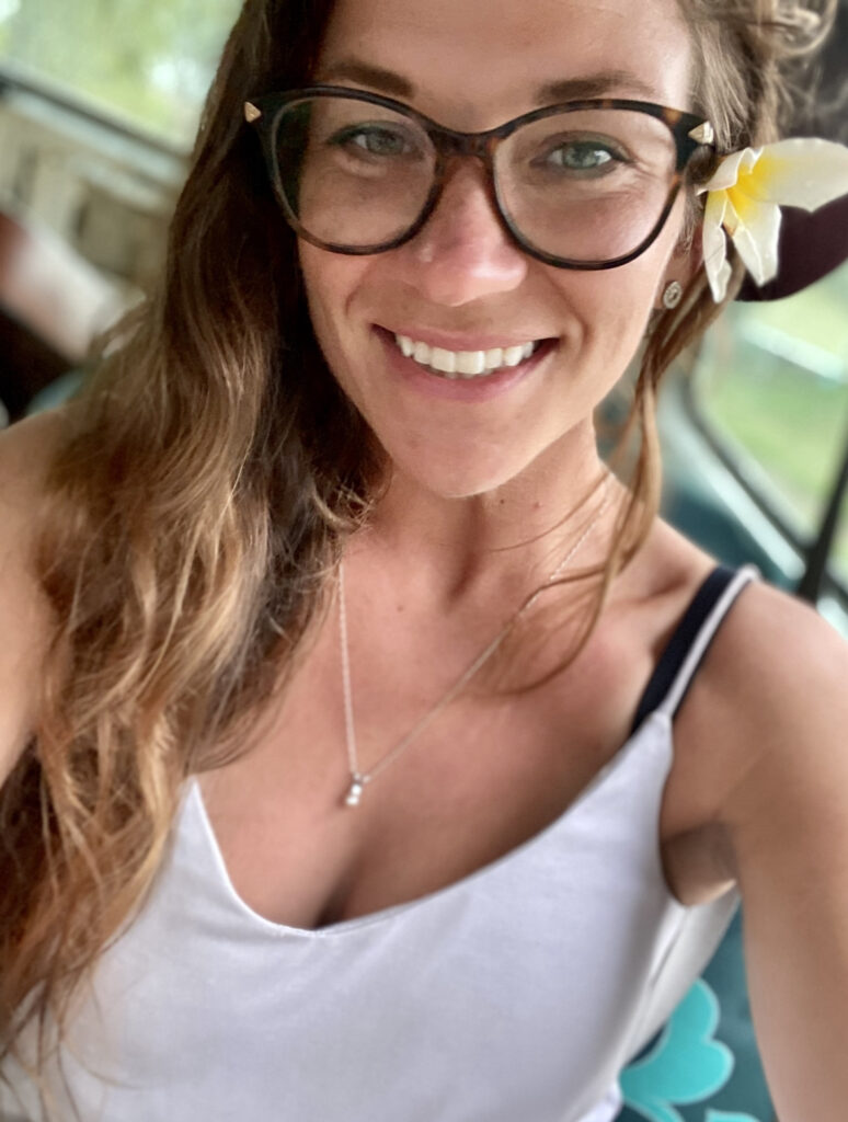 Hi from Ashley with a flower behind her ear in Moorea French Polynesia