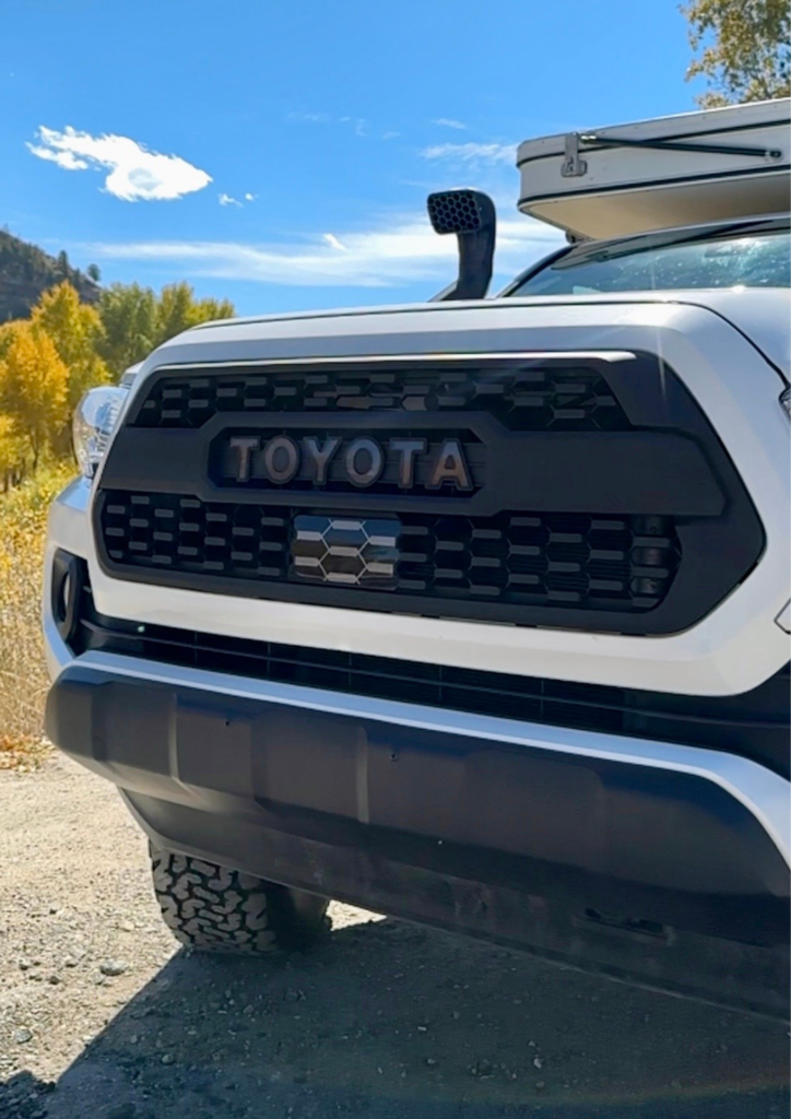 One of One overland build 2023 Toyota Tacoma Bowen Customs Four Wheel Camper Baja Stripes
