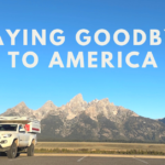 saying goodbye to America with the Tetons in the background with a toyota tacoma and camper overland build