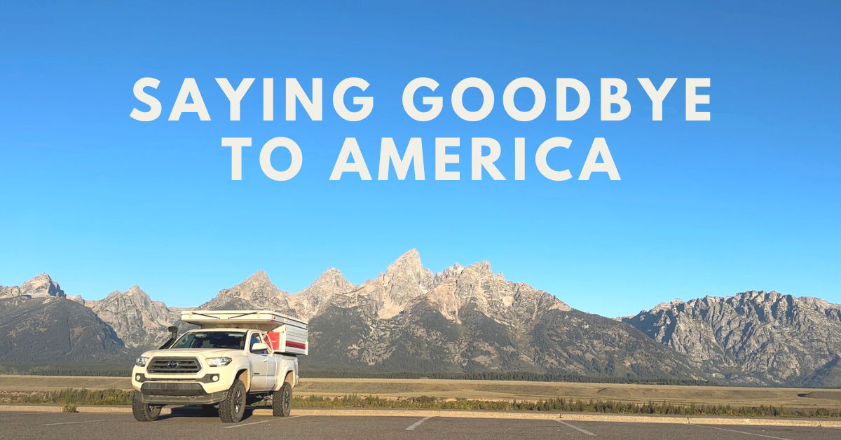 saying goodbye to America with the Tetons in the background with a toyota tacoma and camper overland build